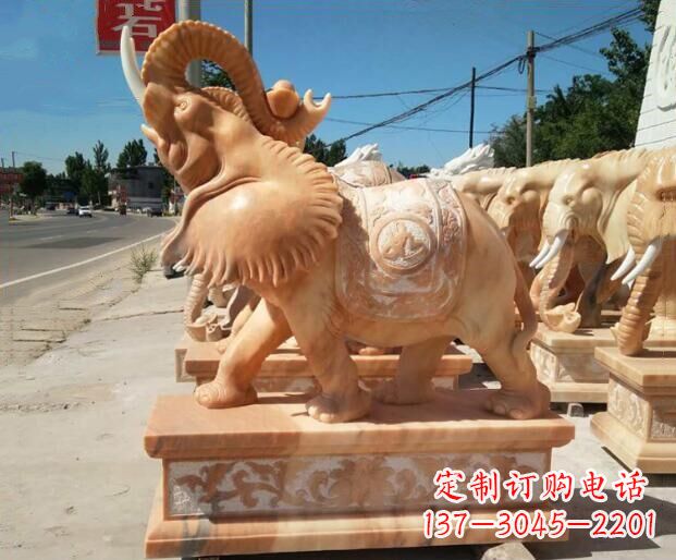 大同鼻子朝天晚霞红门口大象石雕
