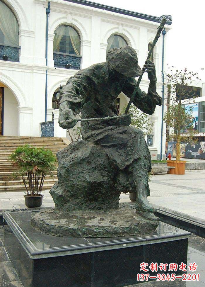 大同步行街拉二胡的人物景观铜雕