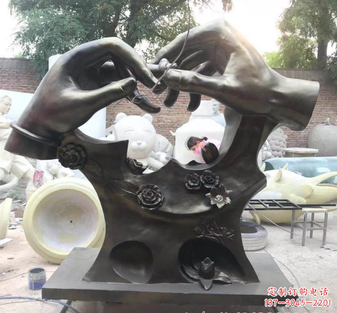 大同戴戒指景观铜雕