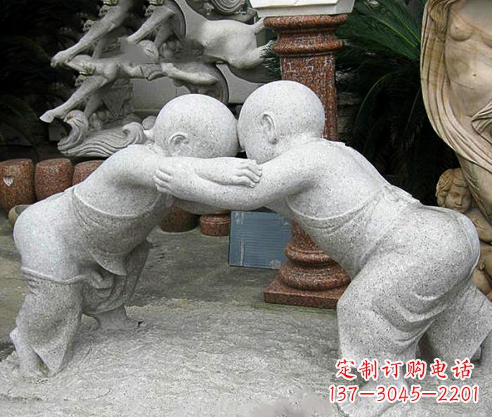 大同可爱小孩摔跤石雕