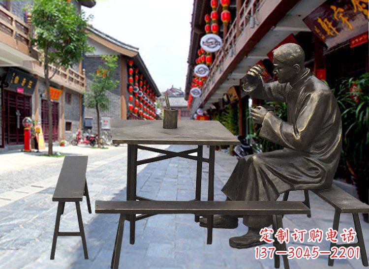 大同享受下午茶时光的店小二喝茶雕塑
