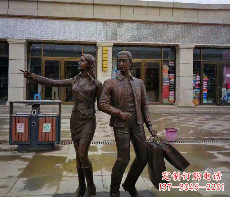 大同逛街购物的情侣人物铜雕