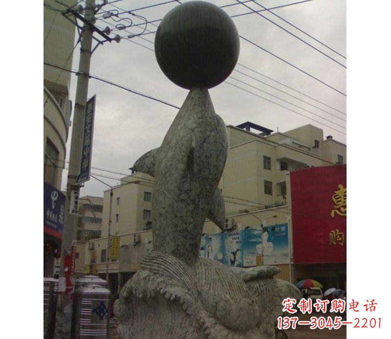 大同海豚戏球石雕