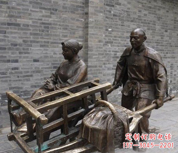 大同推独轮车的人物铜雕