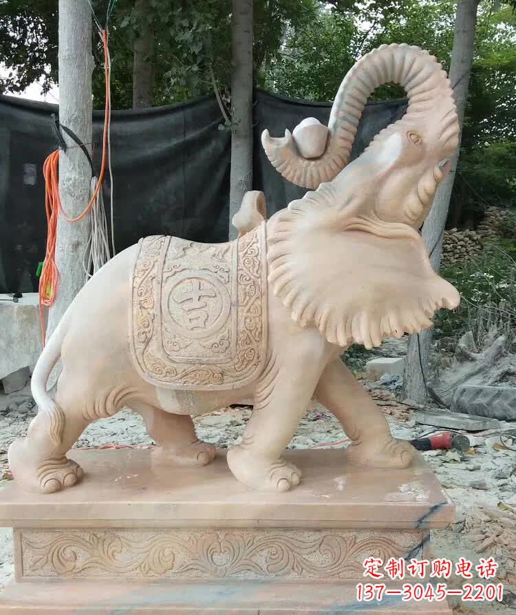 大同晚霞红卷元宝大象雕塑