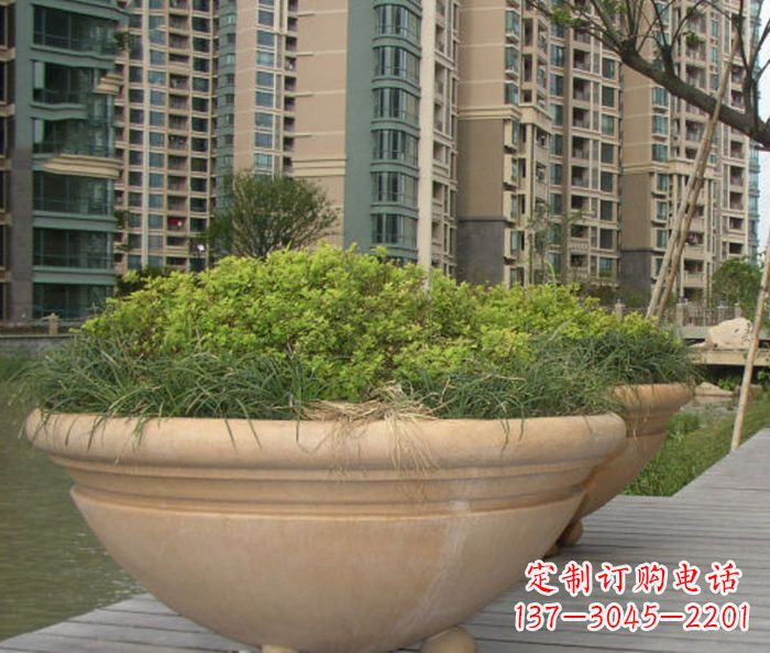 大同小区景观晚霞红花盆石雕