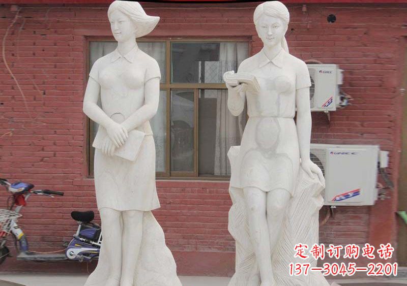 大同校园拿书本的学生石雕