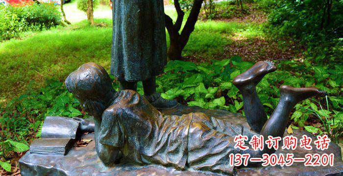 大同校园趴着看书的小男孩人物铜雕