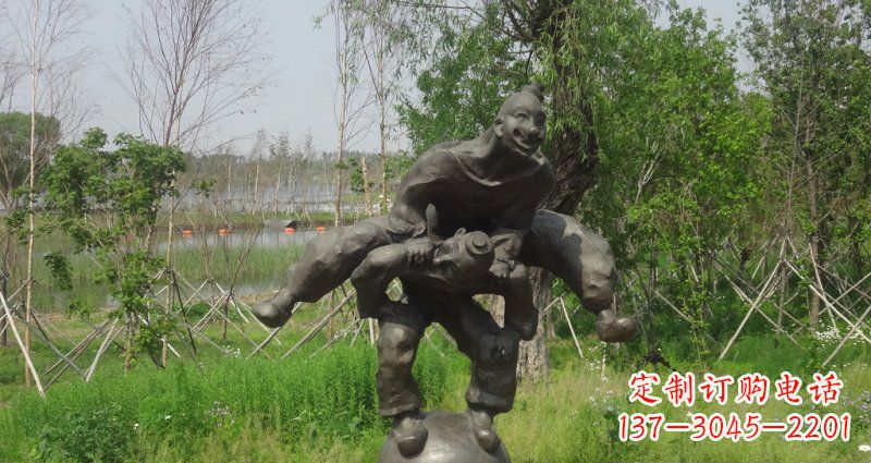 大同园林站在球上面跳山羊的人物景观铜雕