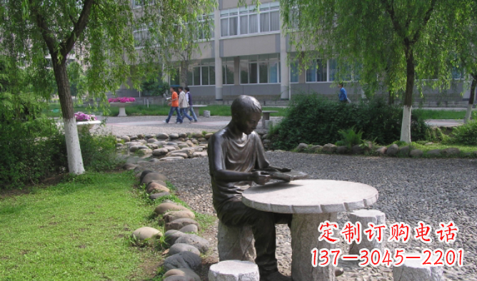 大同坐石桌凳看书的学生铜雕